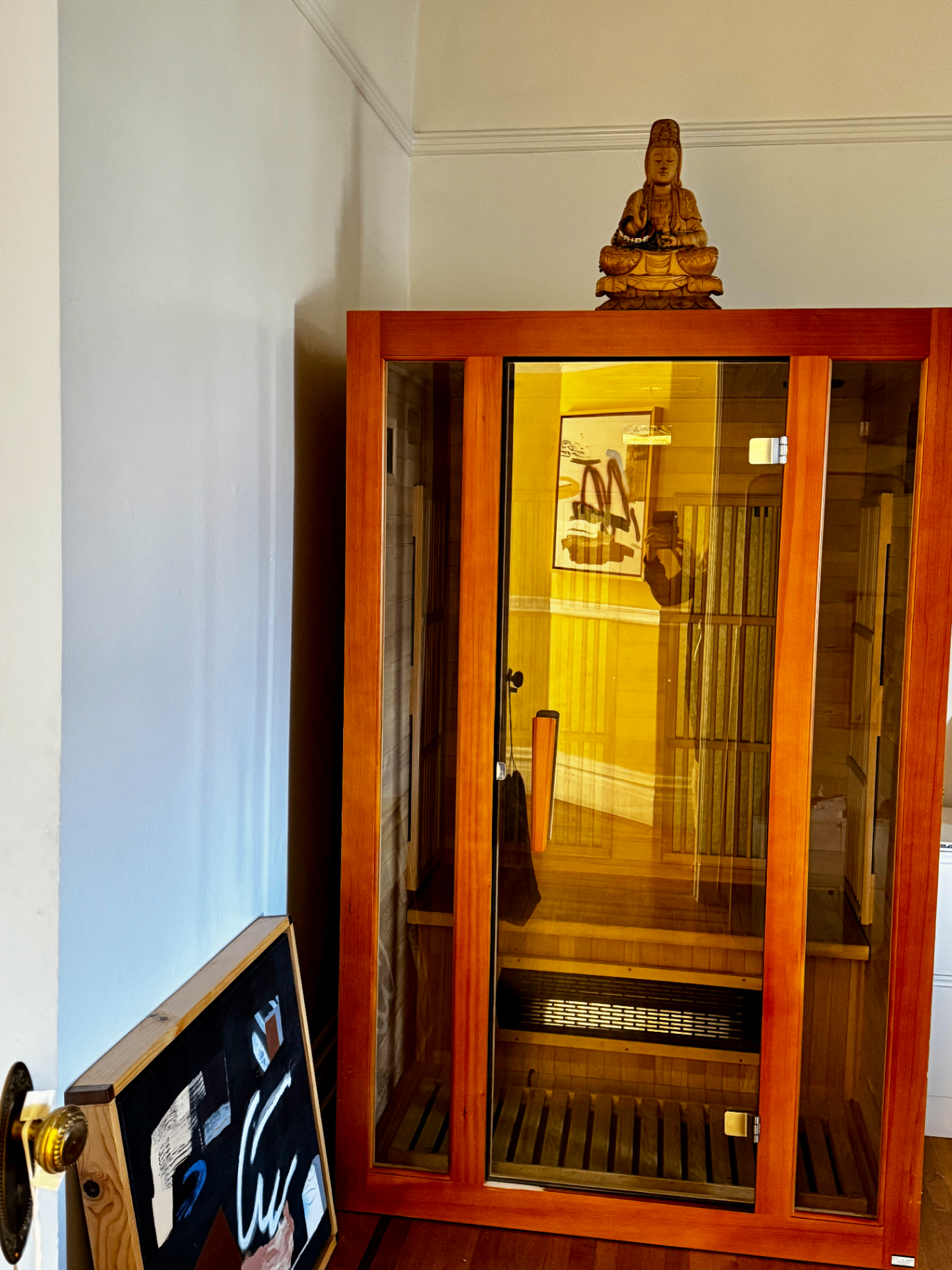 Indoor infrared sauna rental glowing in Bay Area home